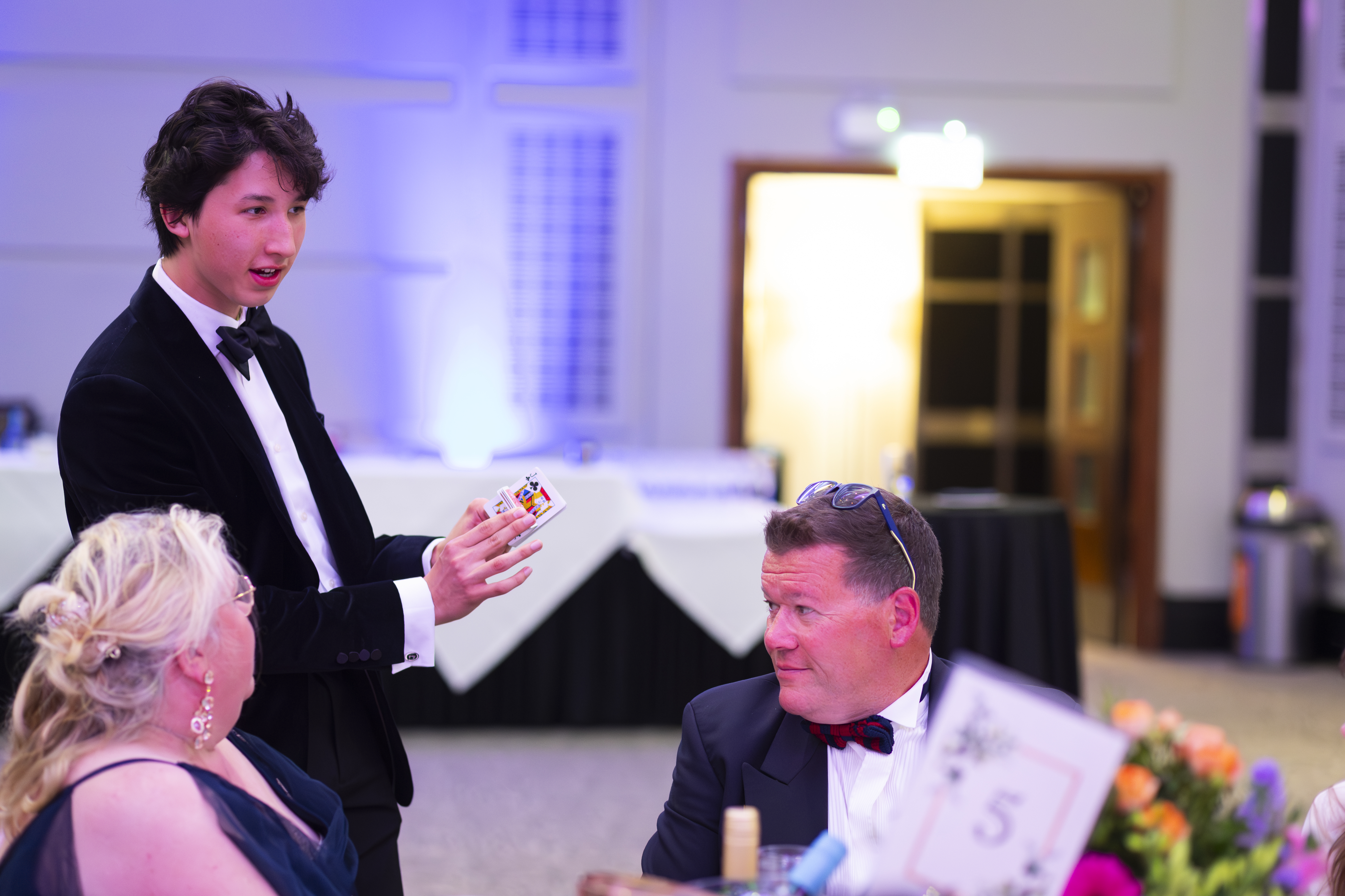 Noah entertaining guests at an event